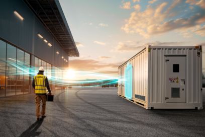 Battery storage system in front of an industrial hall