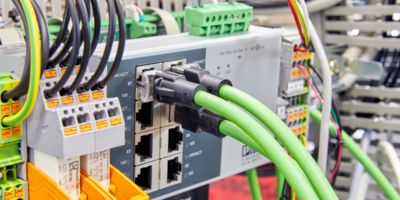 A photo of green wires connected into RJ45 magnetic jacks