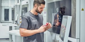 Man with a 3D printer