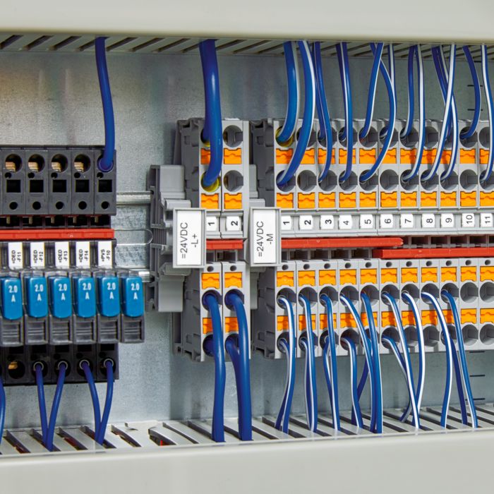 Terminal blocks with orange push button elements