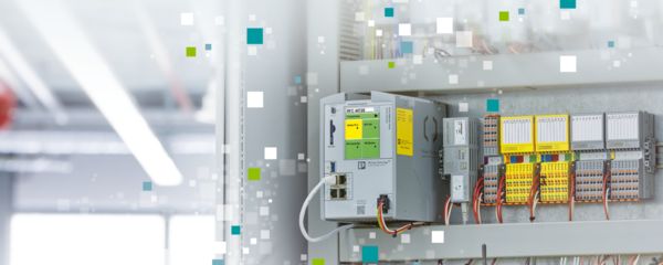 A photo of the inside of a cabinet featuring wire management systems and PLCnext Technology, yellow and green panels, surrounded by illustrations of floating teal, green, and white boxes.