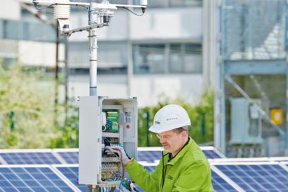 Technician checks meteorological data acquisition