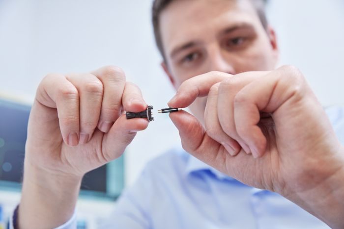 Connector held in hands