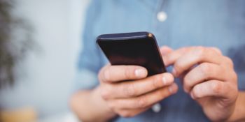 People with smartphones in their hands