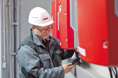 Technician checking the feed-in management