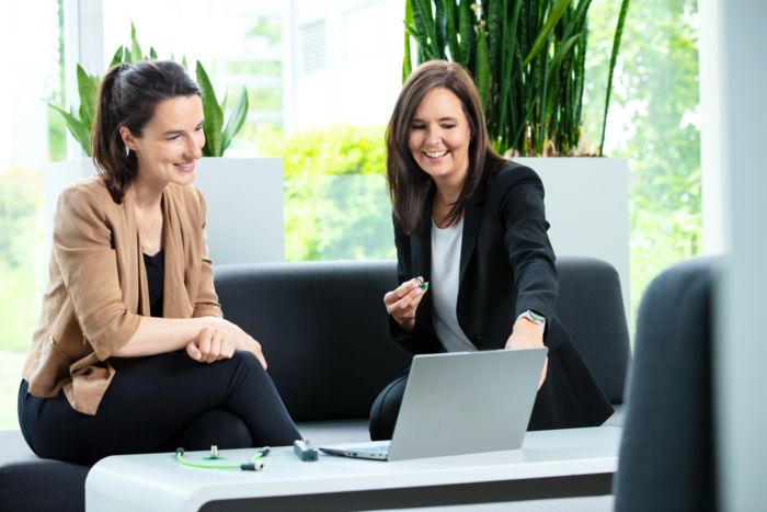 Verena Neuhaus (right) from Phoenix Contact talking to a customer