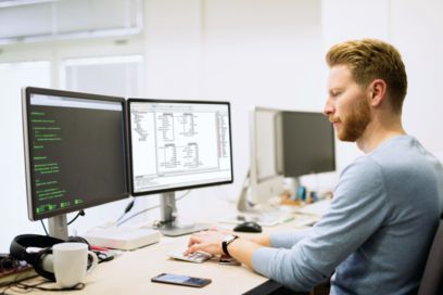 Person in front of screen with a view of the Solarworx software library