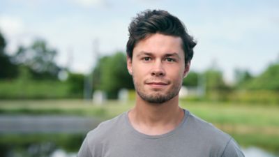 Man with grey shirt