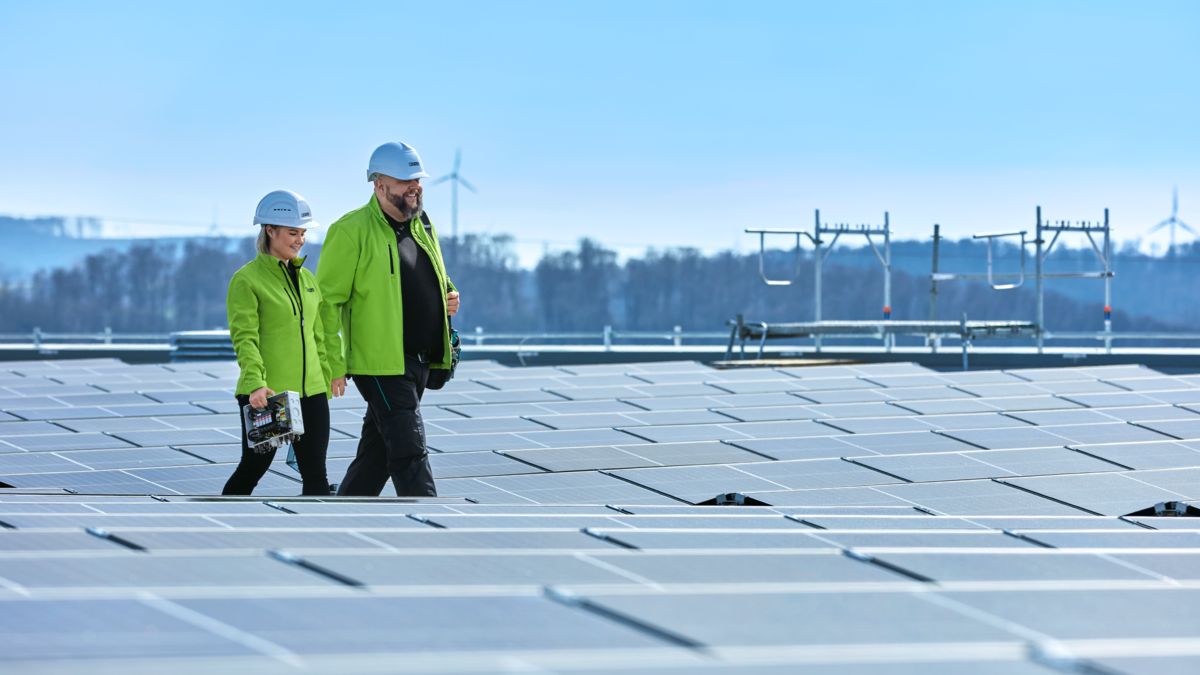 Persons between solar rooftop system