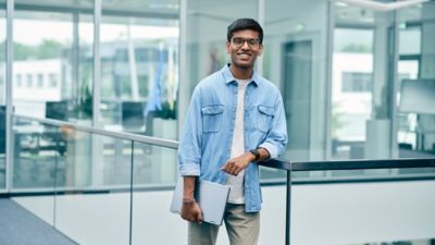 Person with a laptop in an office