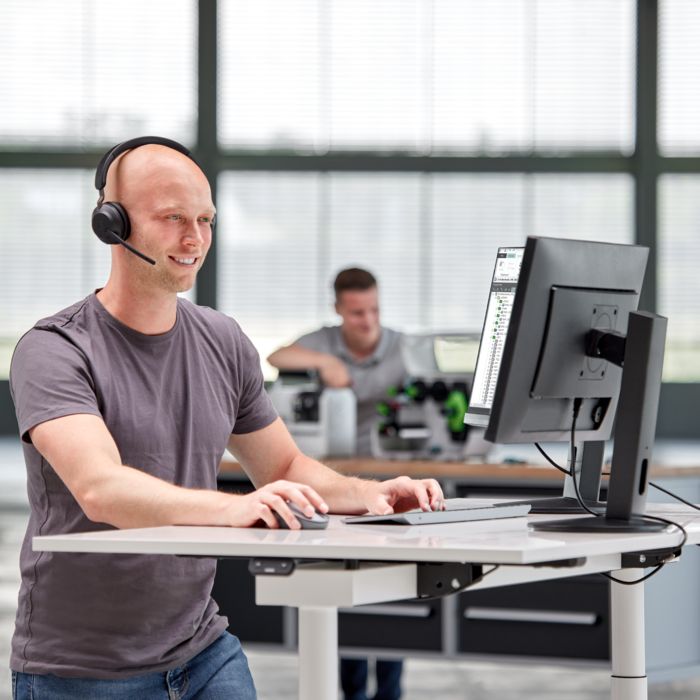 Employee working on individual assembly upon request 