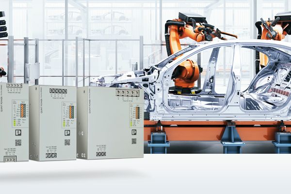 Fontes de alimentação QUINT POWER com SFB Technology à frente de uma oficina automóvel