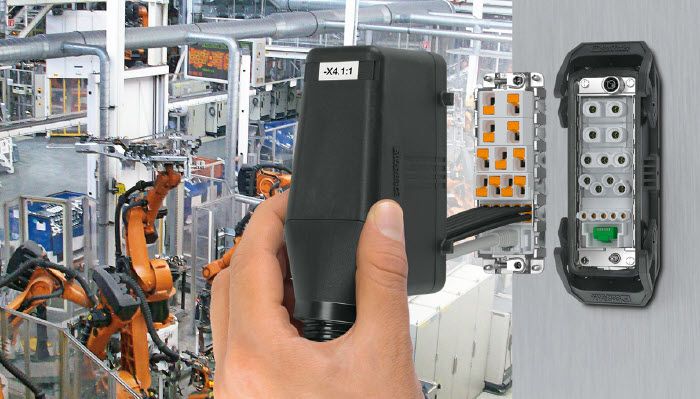 Hand holding a heavy duty connector