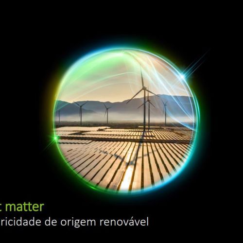 Imagem com torres eólicas e painéis solares