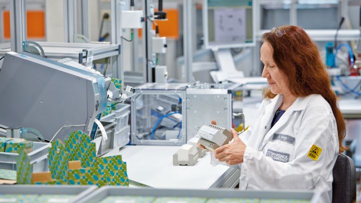 Phoenix Contact employee carrying out quality control