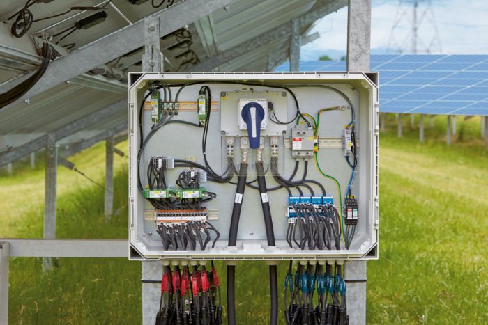 String combiner box with surge protection under a photovoltaic system