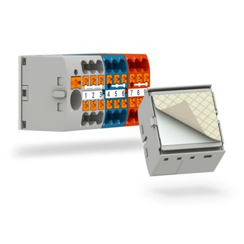Distribution blocks with adhesive pad for adhesive mounting