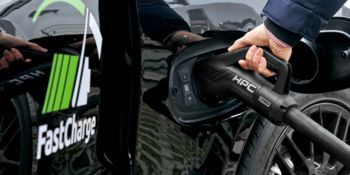 HPC charging connector (High Power Charging) is plugged into the electric car
