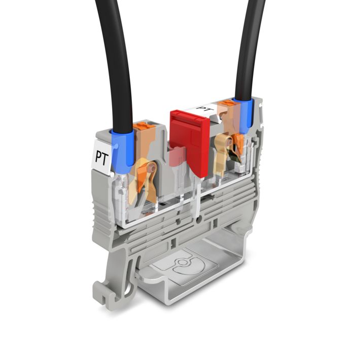 Push-in terminal block with plugged-in conductors and bridge