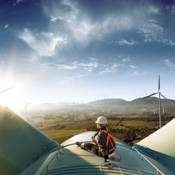 Man at the top of a windmill