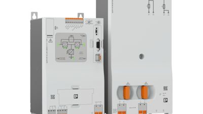 Product photo of a power supply unit, mostly grey with a few orange parts, against a white background.