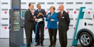 2016: US President Barack Obama and German Chancellor Angela Merkel hold the future of fast charging technology in their hands at the Hannover Messe. It is the prototype of the HPC charging connector.