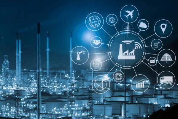 Industry 4.0 system at night with symbols for the smart factory