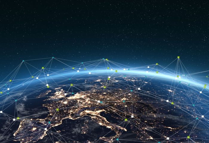 World map with networking lines – vision of the “All Electric Society”