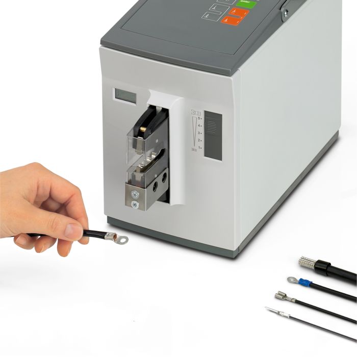 CF 500 crimping device with various crimped conductors and connectors 