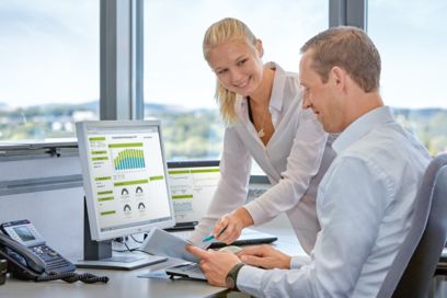 Two people talk about energy monitoring