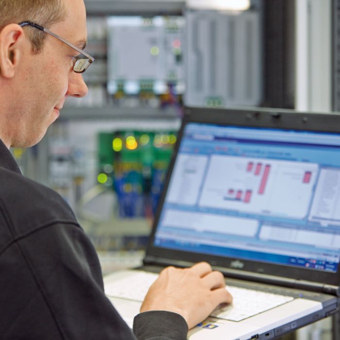 The charging controller is programmed by a person using ready-made function blocks in PC Worx
