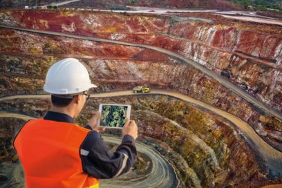 Man with tablet at a mine