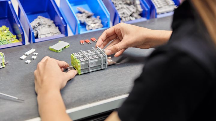 Person producing a terminal strip