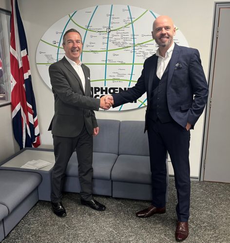 Colin Green and Andy Mills shaking hands